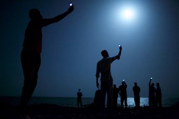 'SIGNAL'BY JOHN STANMEYER WINS WORLD PRESS PHOTO OF THE YEAR 2013